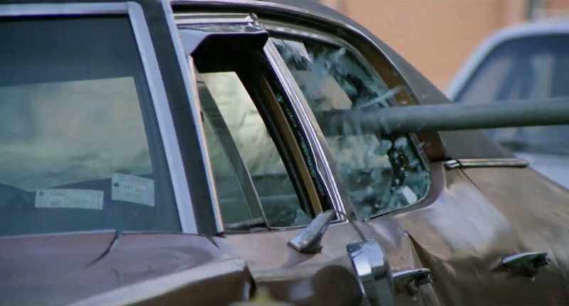 (thugs shouting) (glass shattering)
