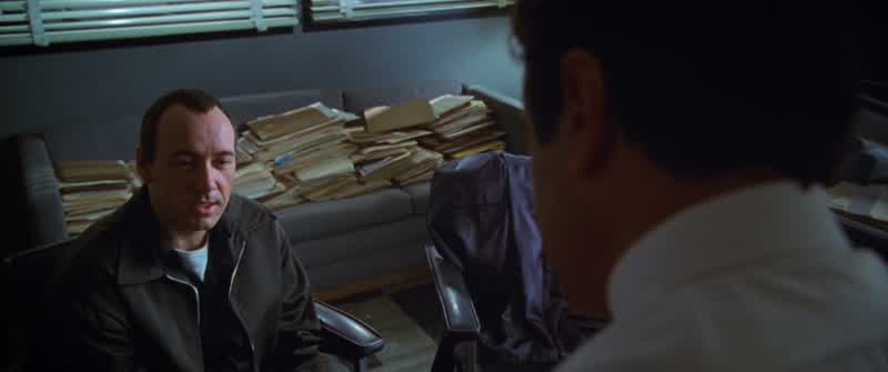 To a cop the explanation is never that complicatedIt's always simpleThere's no mystery to the street no arch criminal behind it allIf you got a dead body and you think his brother did ityou're gonna