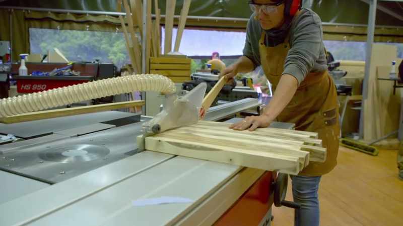 To complete her door panels, Charlie cuts her board