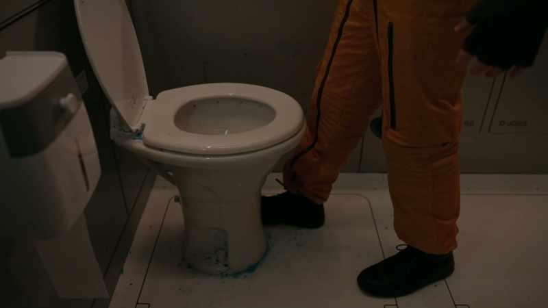 [toilet flushing]
