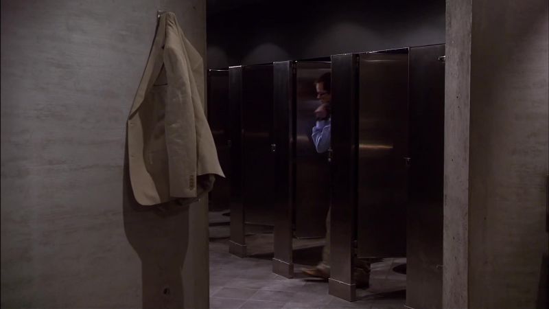 [toilet flushing]