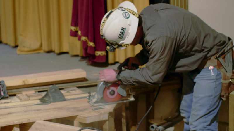 [tools whirring and grinding]