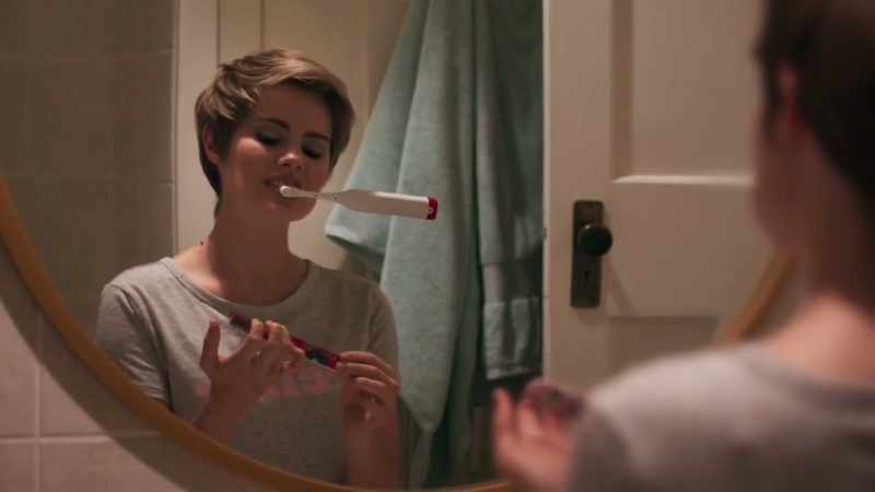 [toothbrush buzzing]