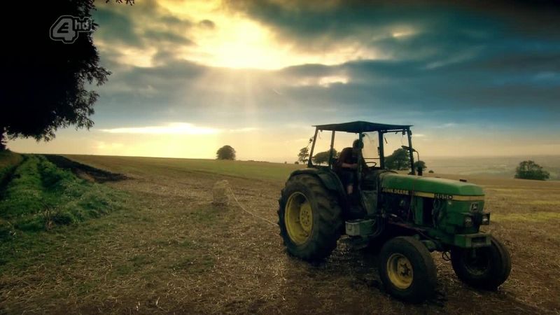 (TRACTOR STARTS UP)