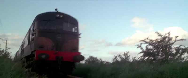 (train rumbling)