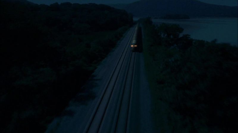 (train whistle blows)