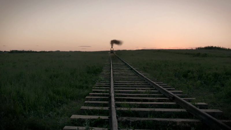 [train whistling]