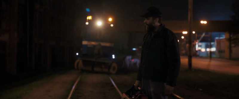 Tram stop running in the night. Construction