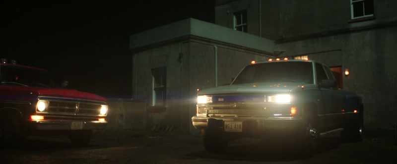 (truck engine roaring)