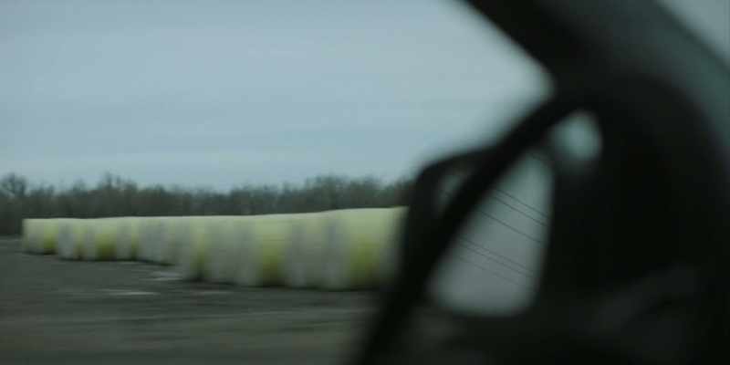 (truck flashes past)