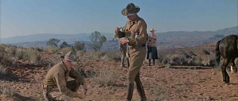Turn him over on his stomach and keep his breeches down