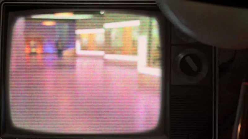 (TV clicks, static)