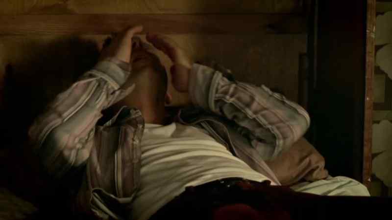 (TV hums)