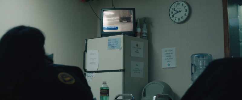 [tv in background]