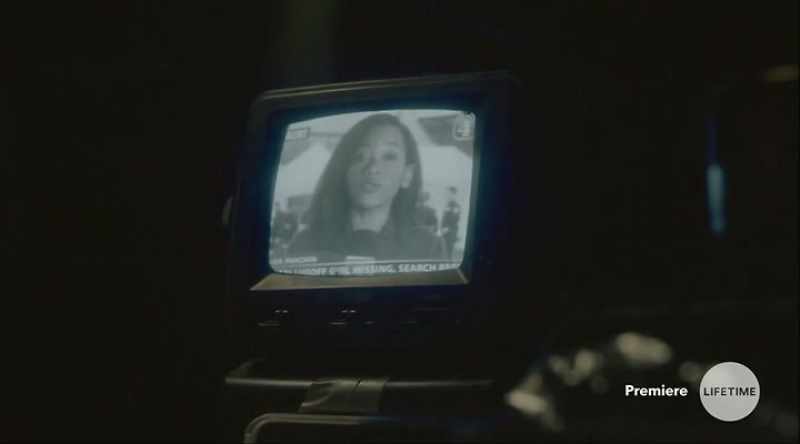 [TV IN BACKGROUND]