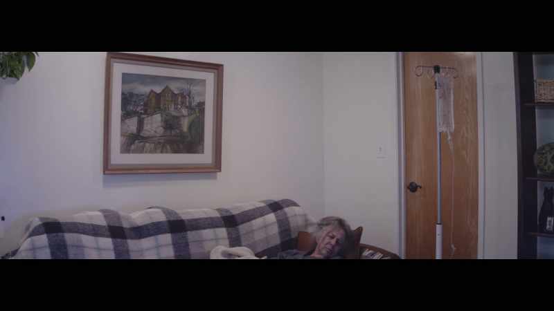 [TV on in the background]