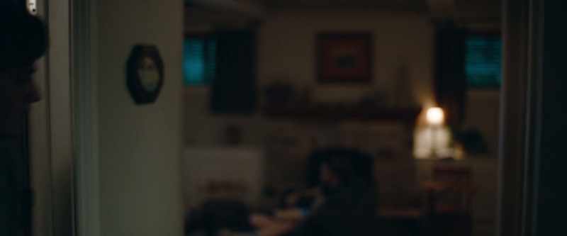 [TV playing in background]