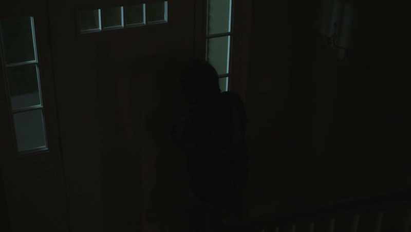[TV playing indistinctly]