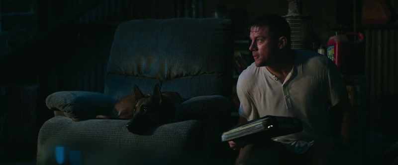 [TV playing indistinctly]