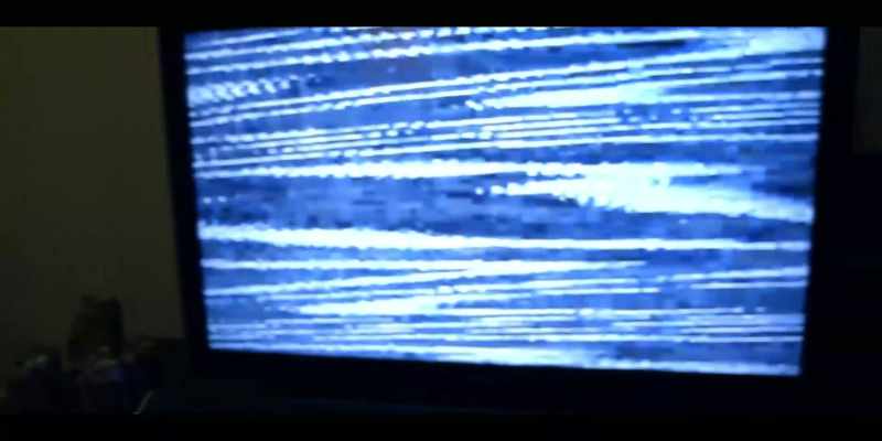 [TV static buzzing]
