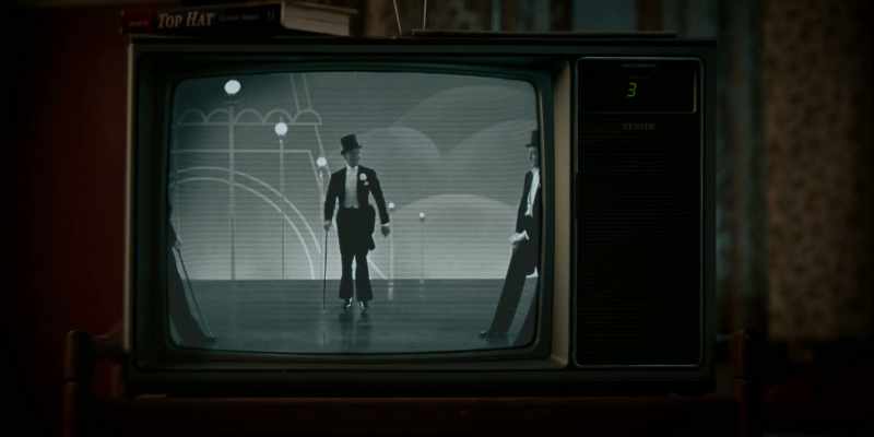 [TV turns on]