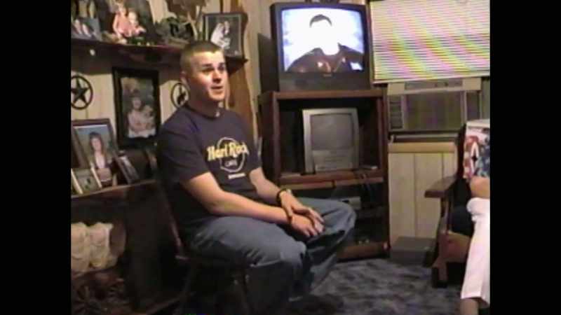 Two dudes kissing on TV