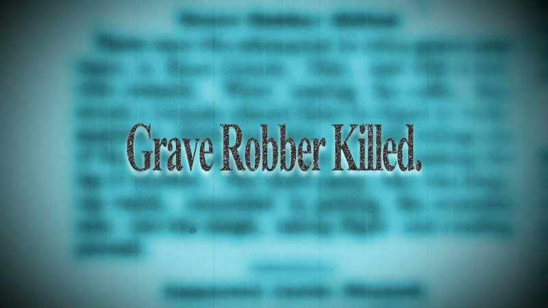 Two grave robbers go after a coffin