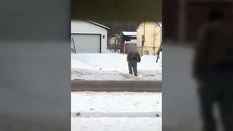 Two men are filming their neighbor