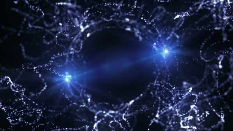 Two physical particles can share properties at a distance