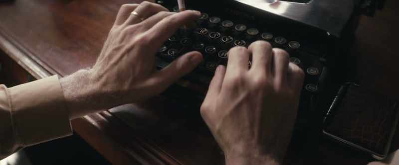 (typewriter keys clacking)
