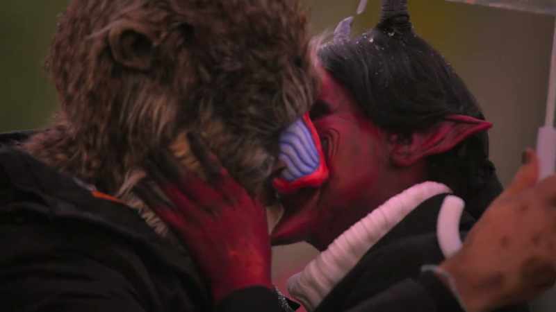Uh, two mutants making out in the drizzle under an umbrella