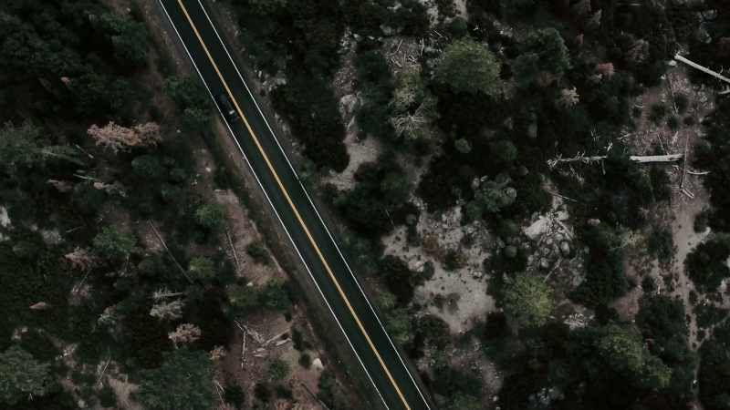 Under the small, old dirt road