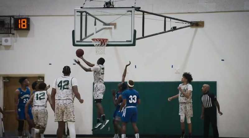 Underneath to a cutting Muhammad. Reverse layup