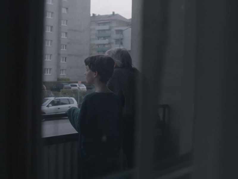 Up there, the left balcony. She lived on the third floor