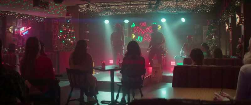[upbeat Christmas music playing]
