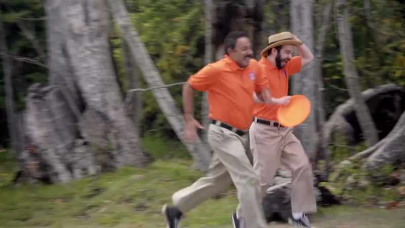 (upbeat rock music playing)
