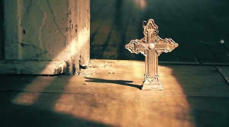 Upon walking in, he saw several crucifixes