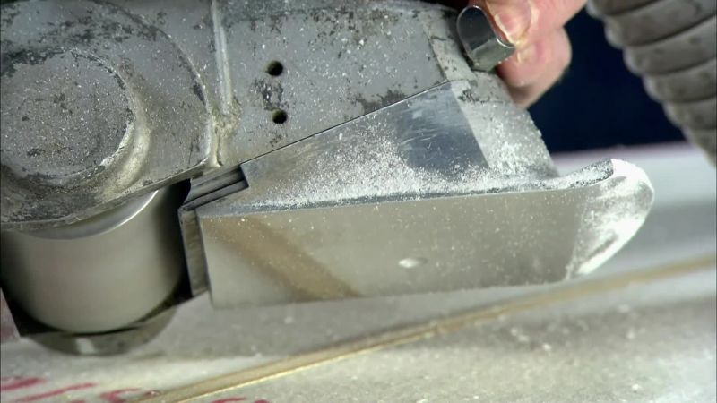 USING A PLANER, HE REFINES THIS STARTING SHAPE