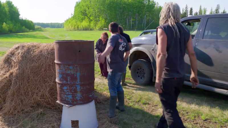 Using an old rusty barrel and an empty ice-cream pail