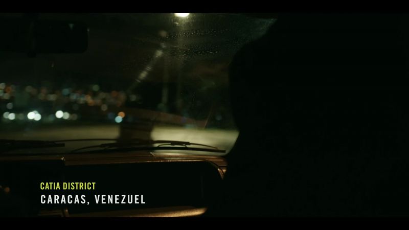 (vehicle engine rumbling)