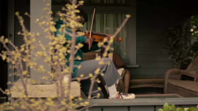 [violin music continues]