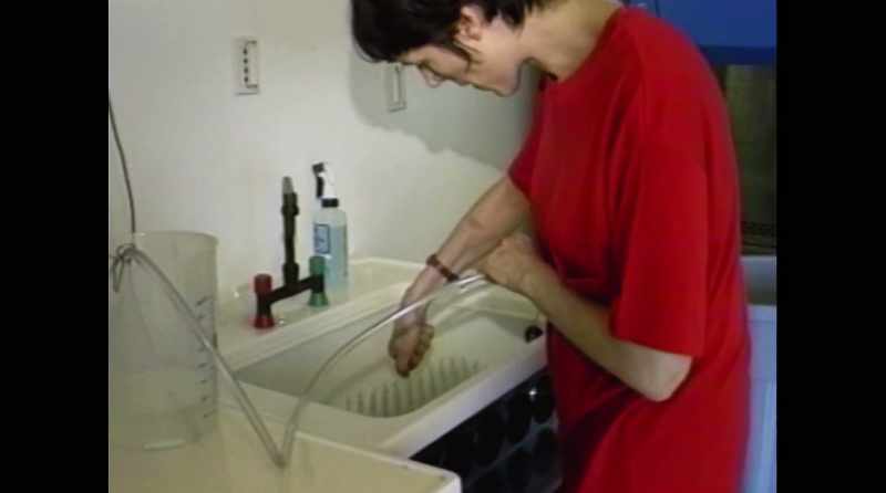 [vocal music playing on radio]