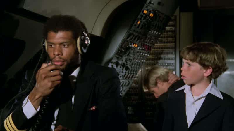 Wait a minute I know youYou're Kareem Abdul jabbarYou play basketball for the Los Angeles LakersI'm sorry son but you must have me confused with someone elseMy name is Roger murdock I'm the copilotYou
