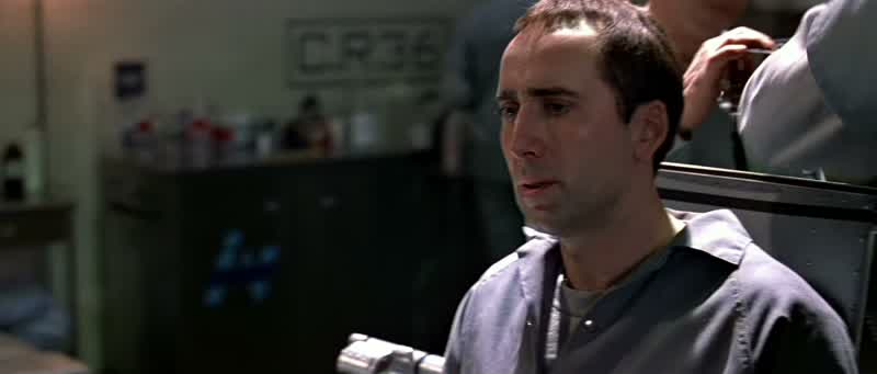 Wait. Hold it. Can I have a light? You know those things'll kill ya. Get his boots, Walton