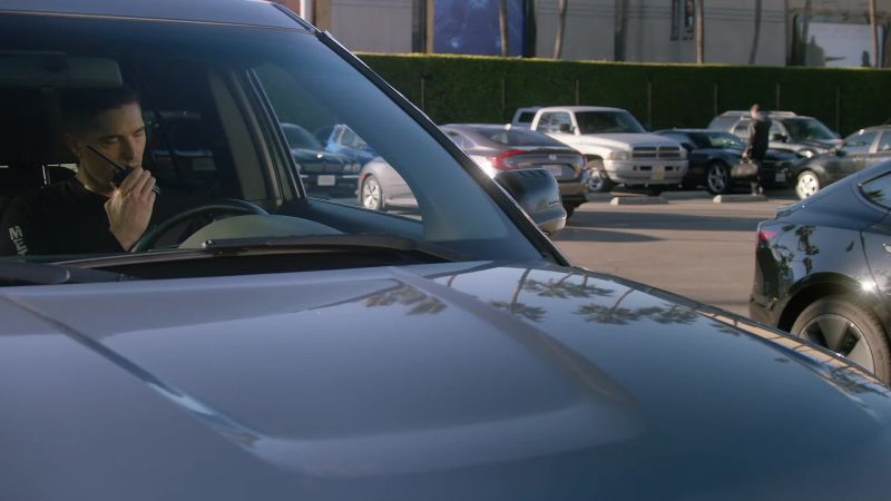 Walking to his personal vehicle