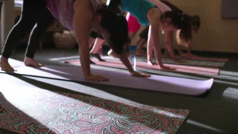 Walking the hands out into downward-facing dog