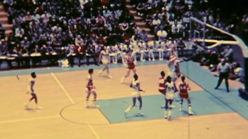 Walton shoots and hits the short shot from the left baseline