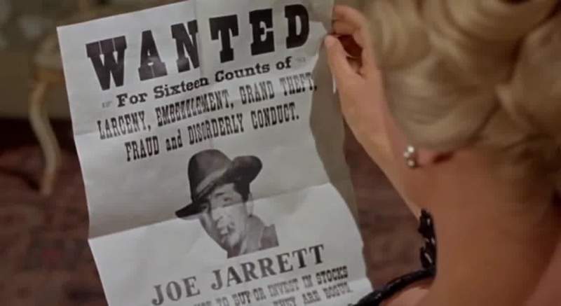 Wanted for 16 counts of larceny