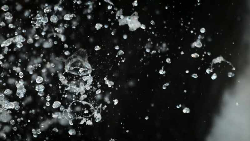 Watch even closer, and you see that each droplet is constantly changing shape