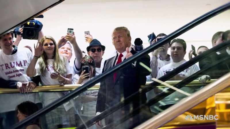 Watching him come out going down those golden escalators